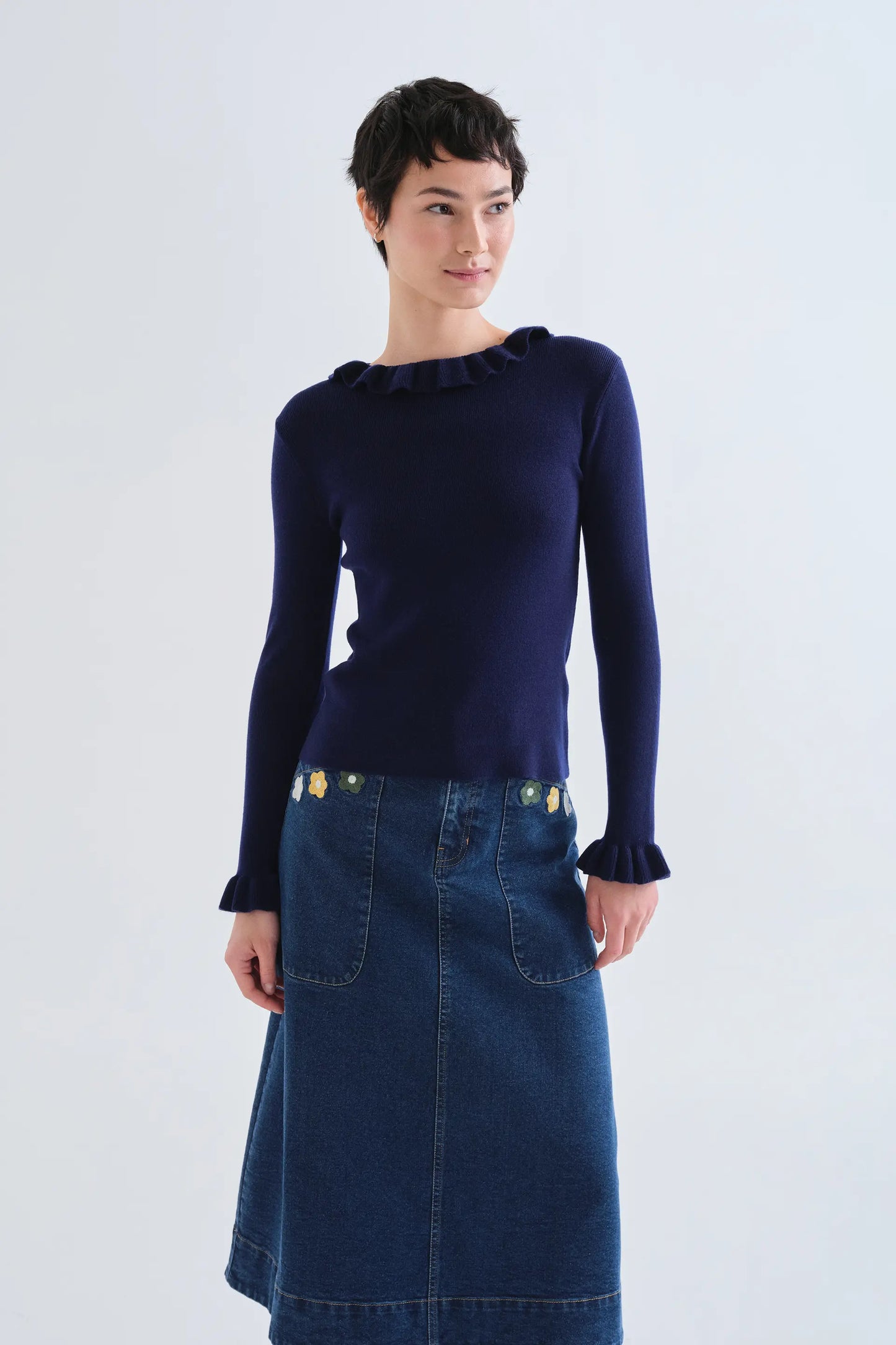 Navy blue knit ruffle top