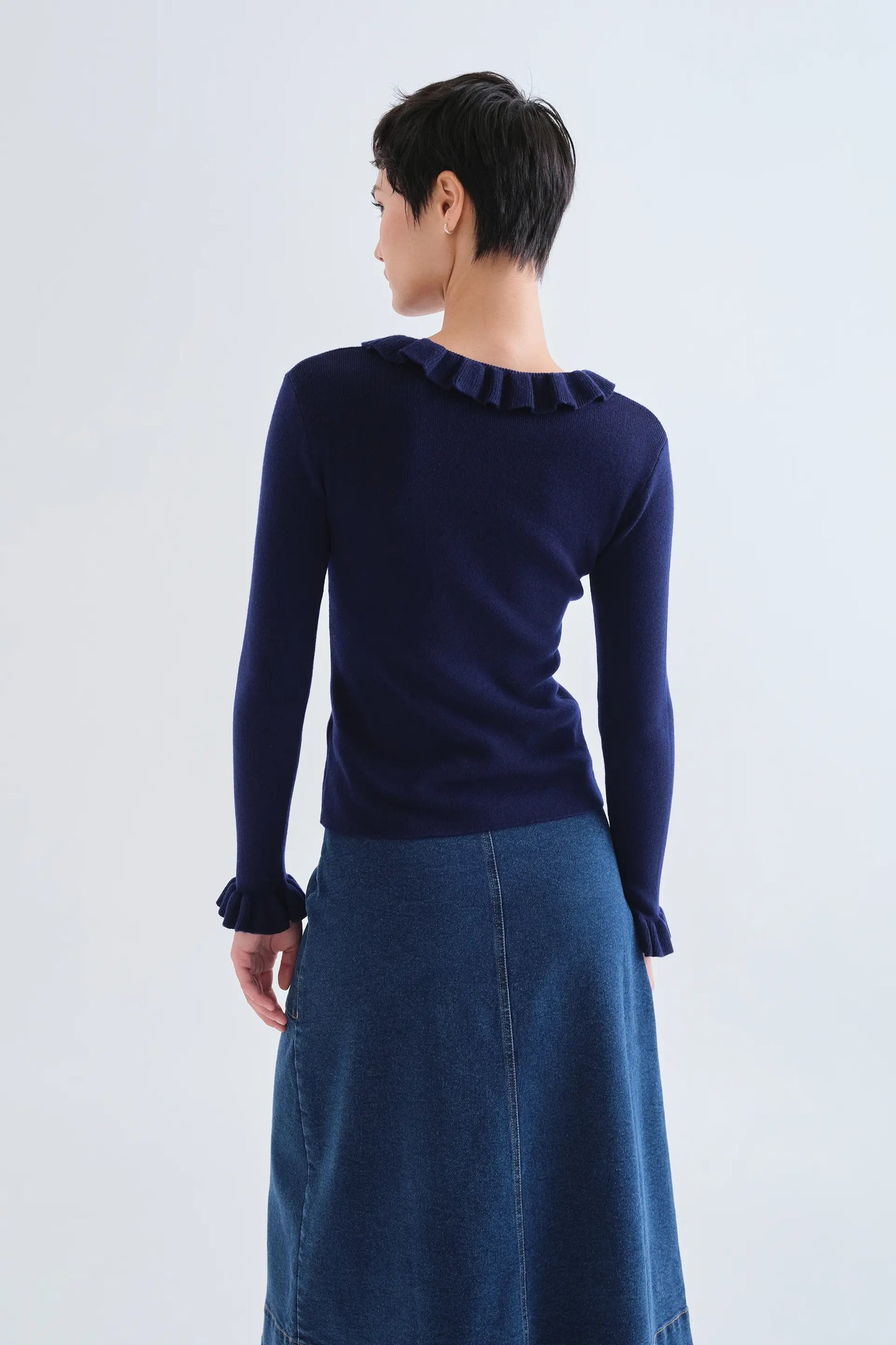 Navy blue knit ruffle top