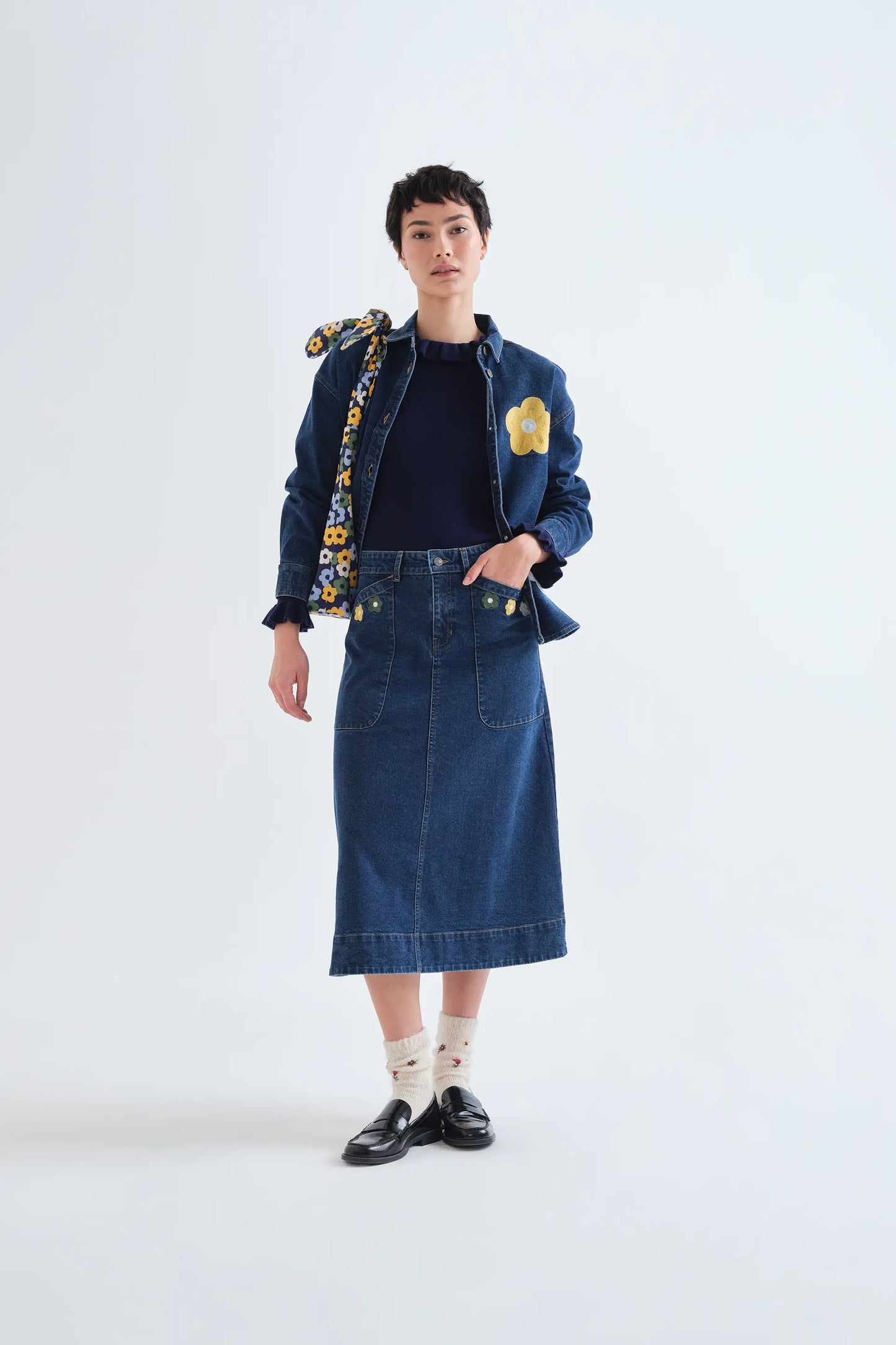 Navy blue knit ruffle top