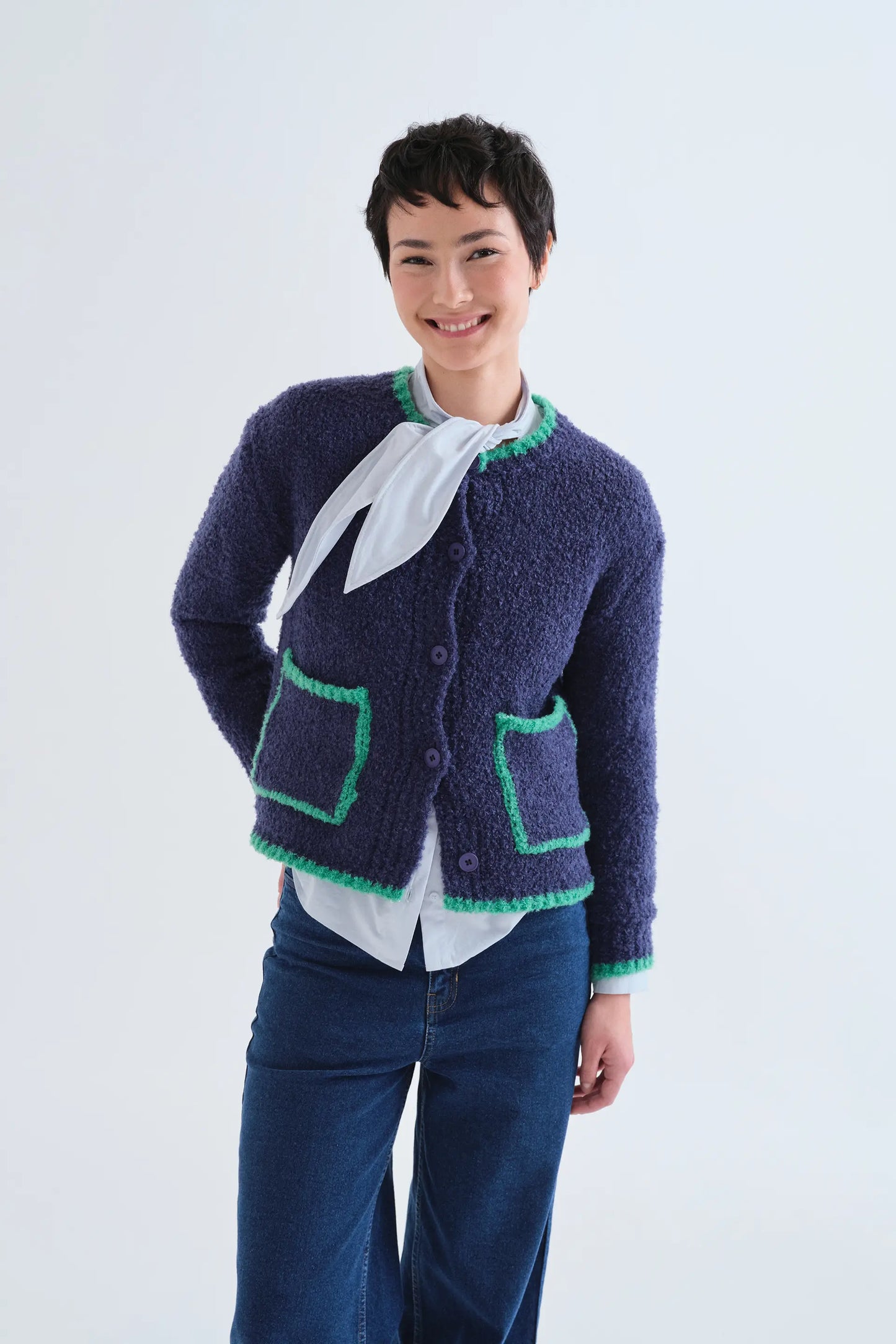 Navy blue cardigan with green details