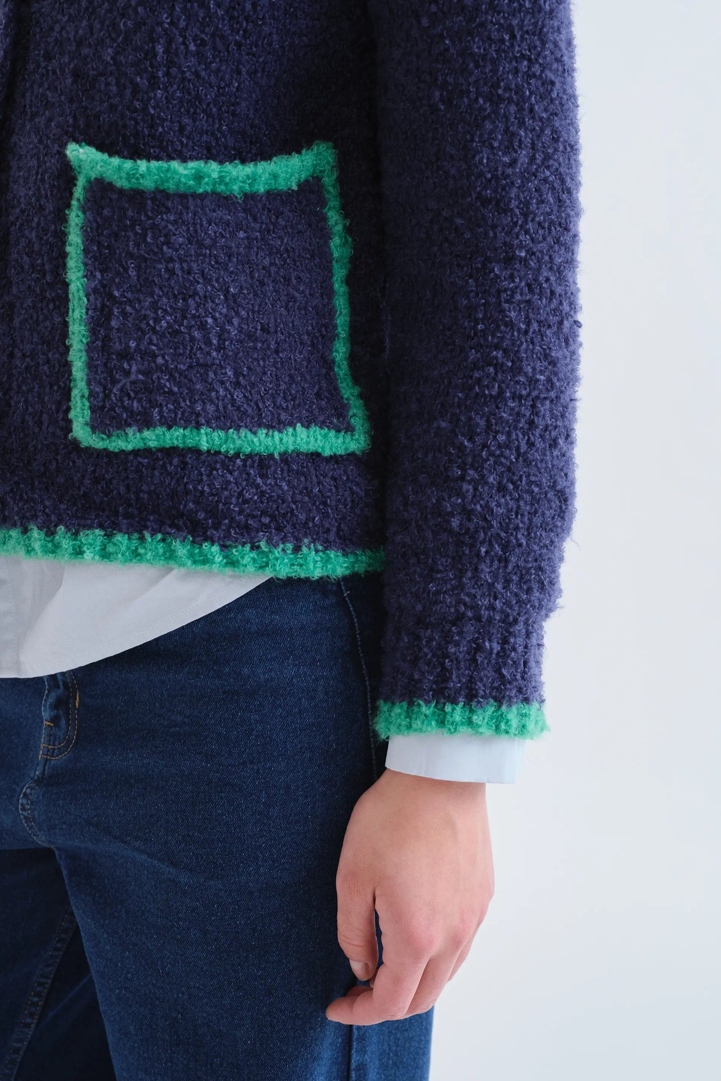 Navy blue cardigan with green details