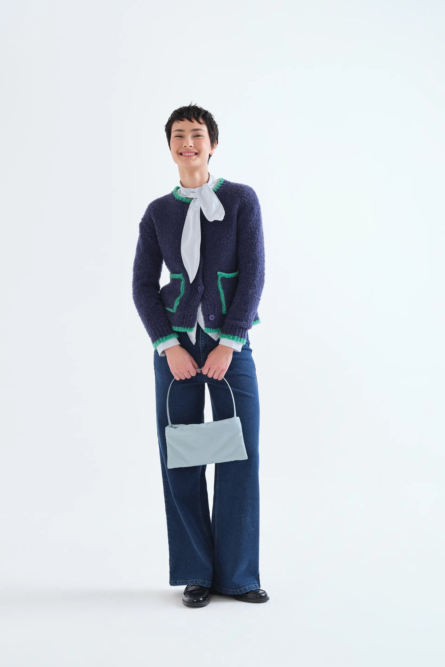 Navy blue cardigan with green details