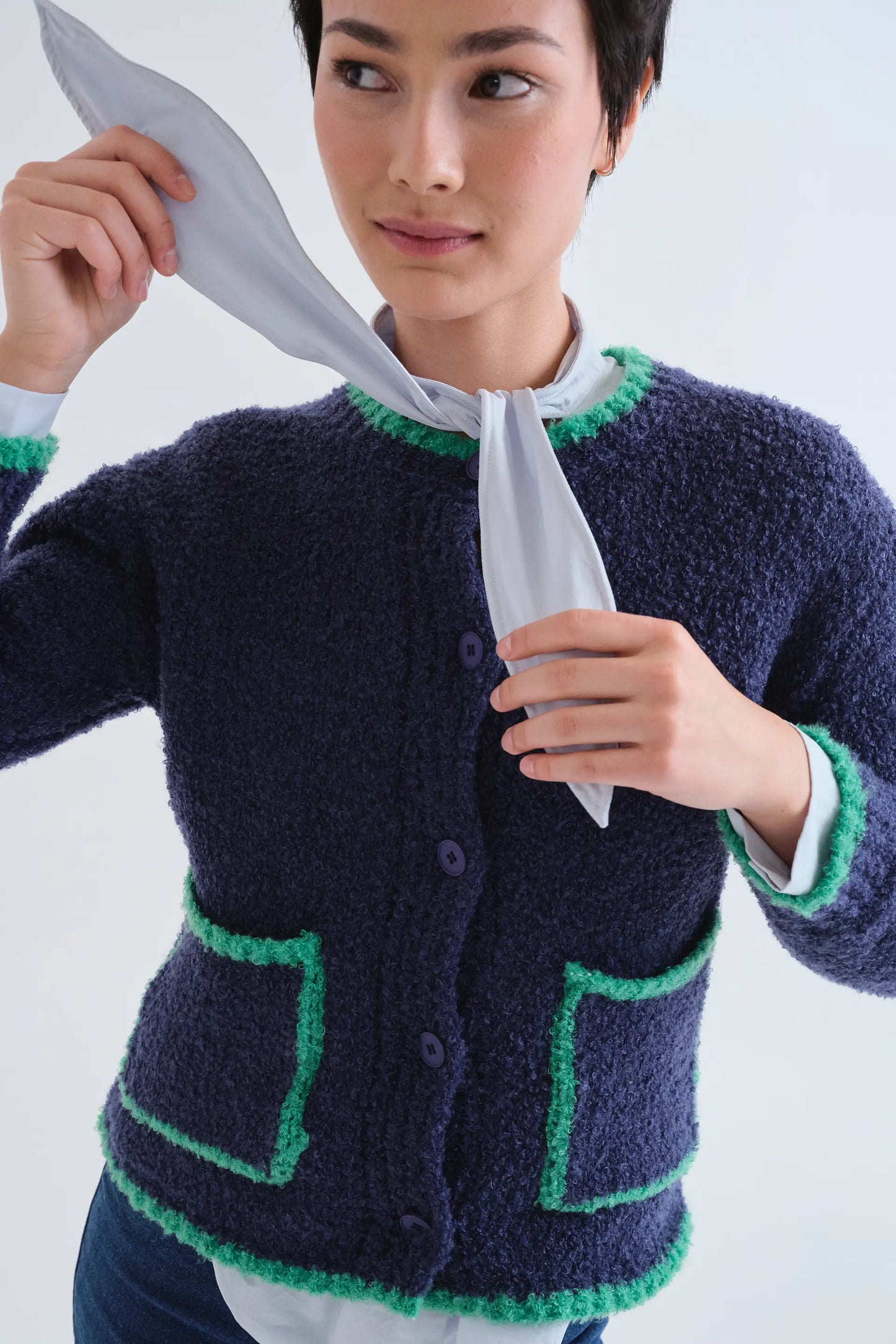 Navy blue cardigan with green details