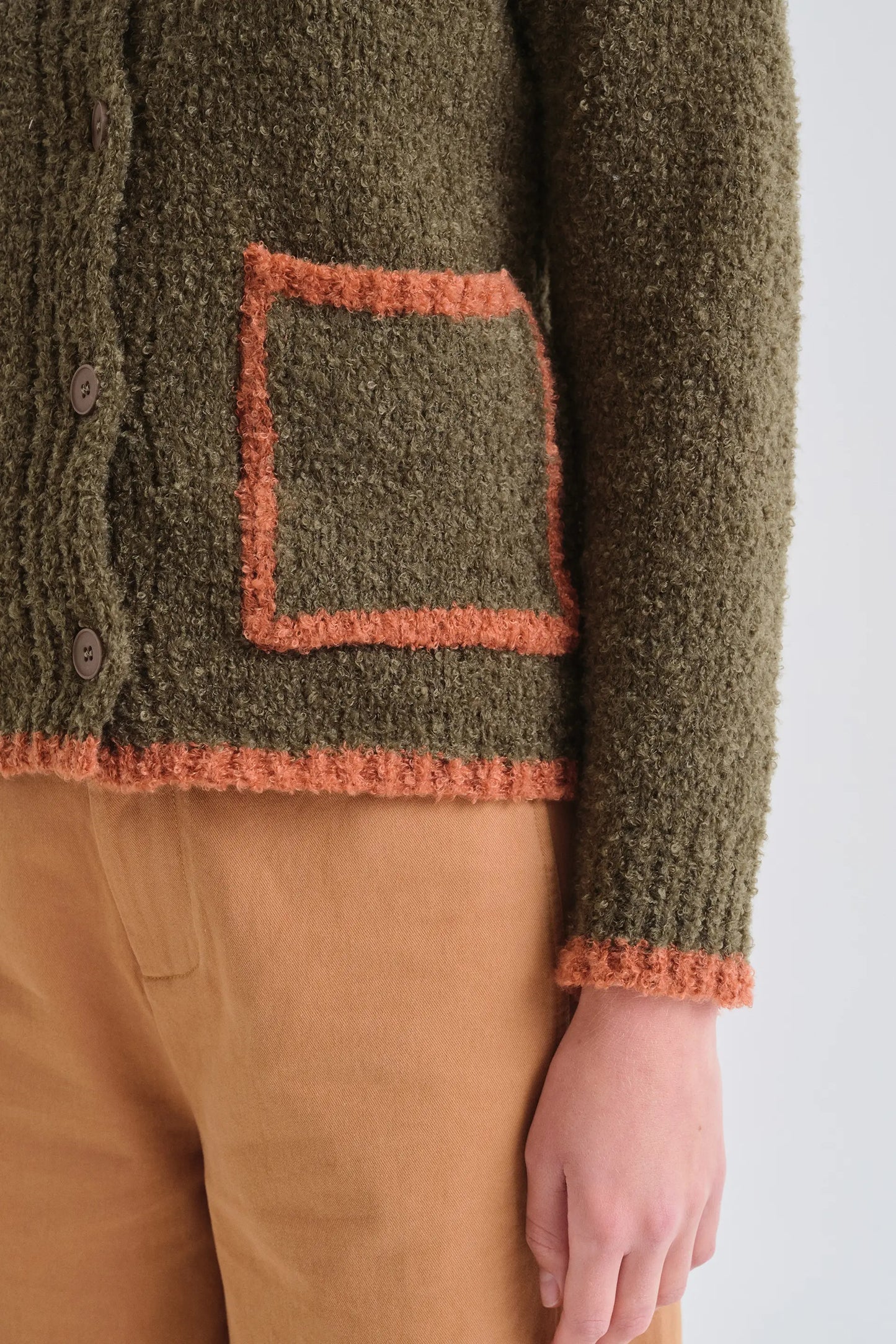 Cardigan bicolore verde scuro e arancione