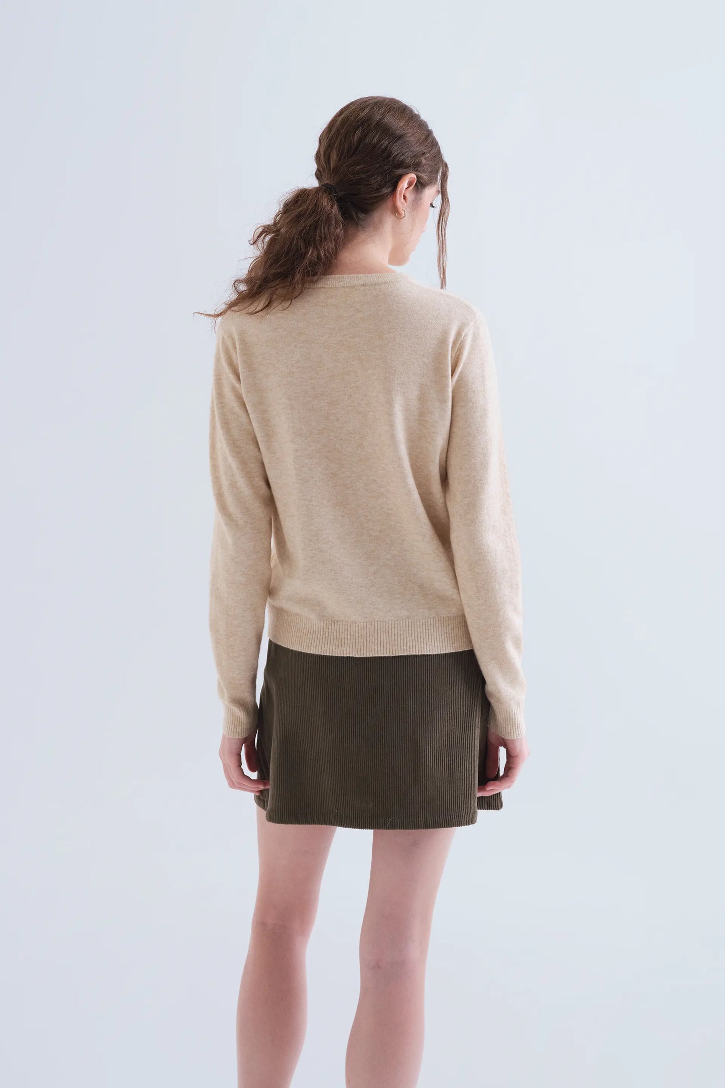 Jersey punto beige con detalle de uva