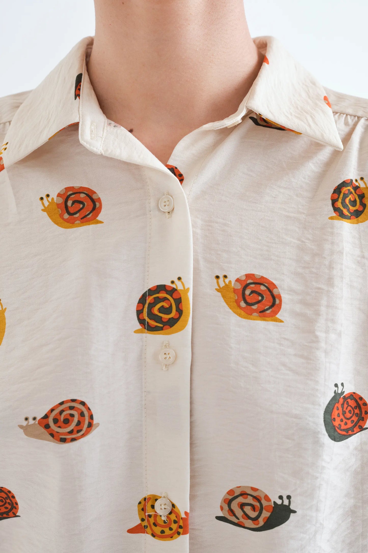 Camicia con stampa di lumache