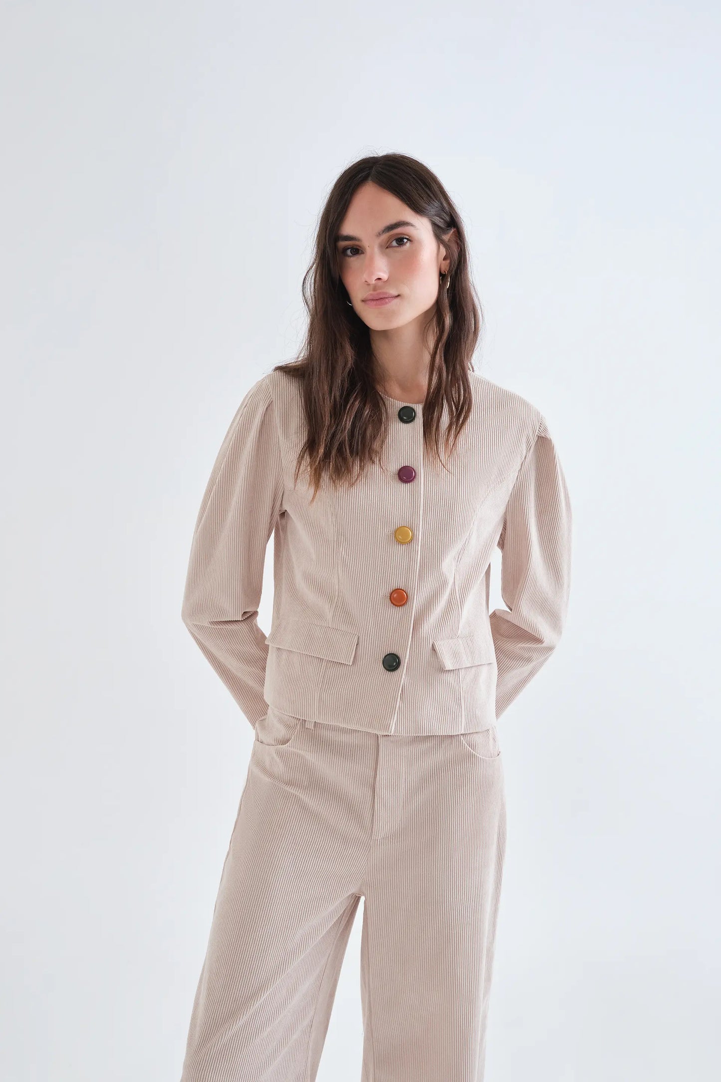 Beige corduroy jacket with multicolored buttons