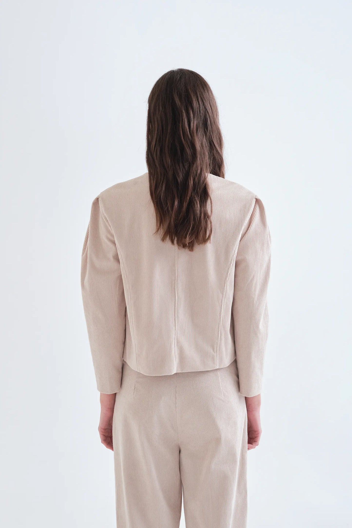 Beige corduroy jacket with multicolored buttons