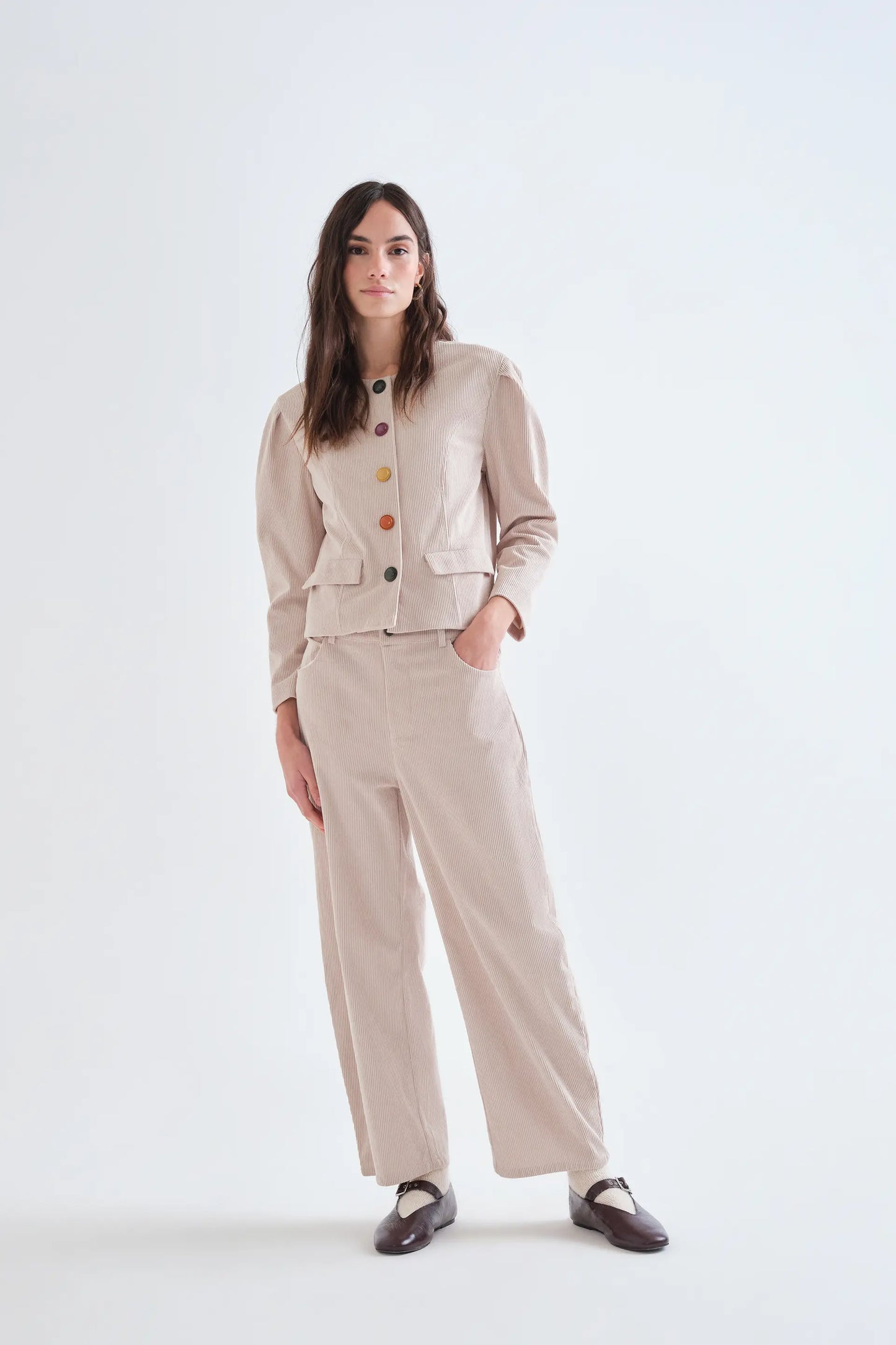Beige corduroy jacket with multicolored buttons