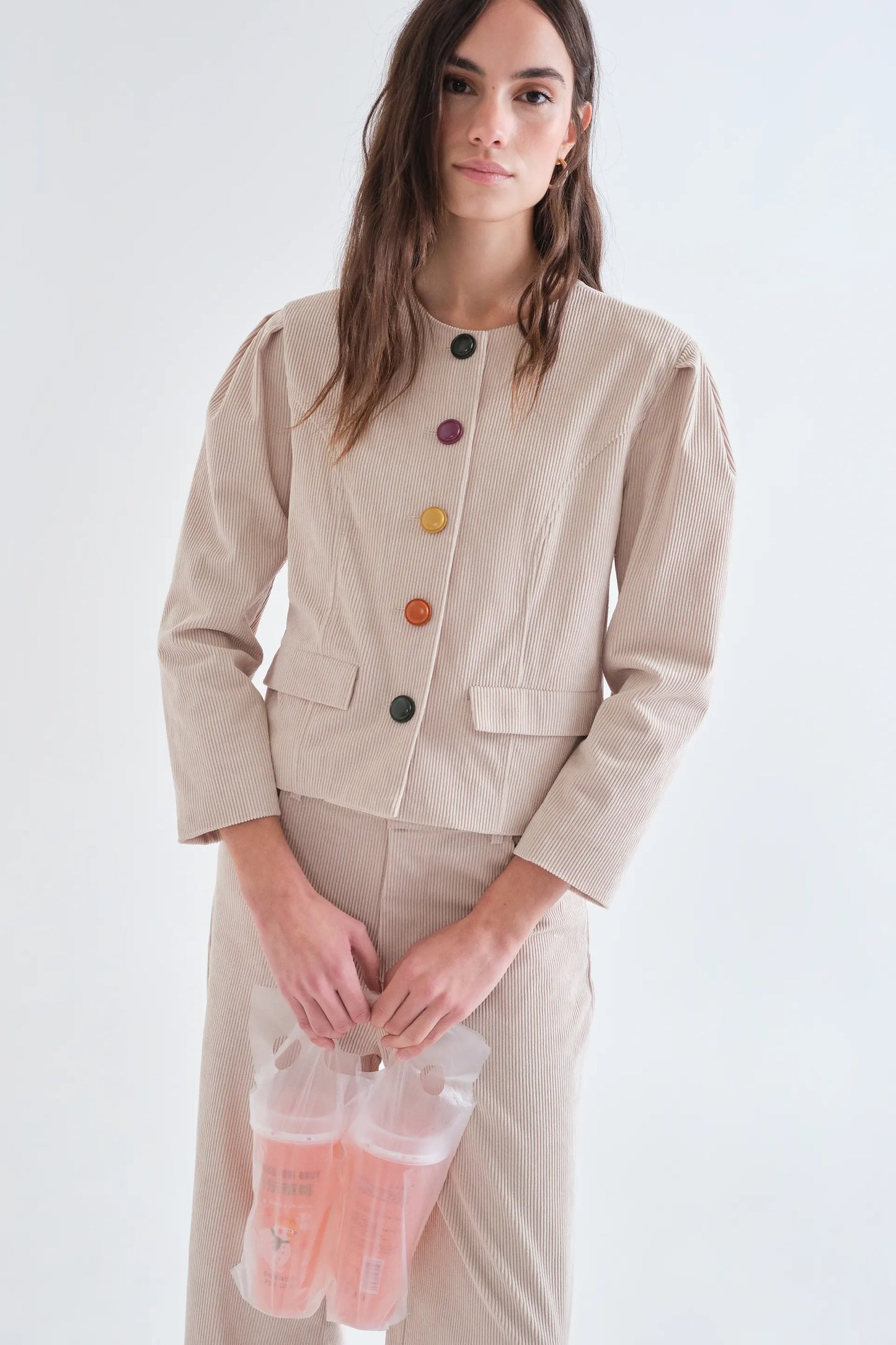Beige corduroy jacket with multicolored buttons