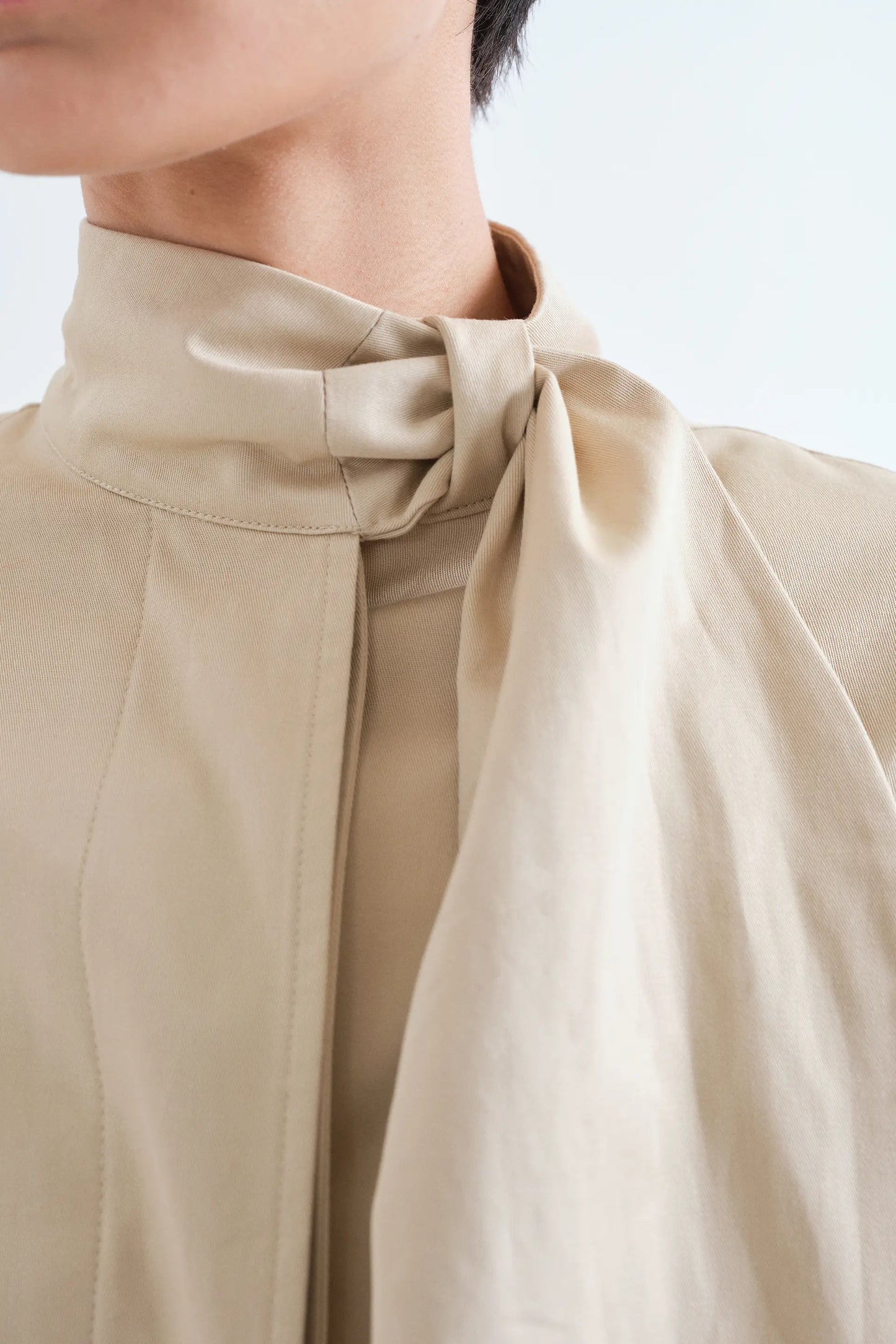 Trench allacciato beige