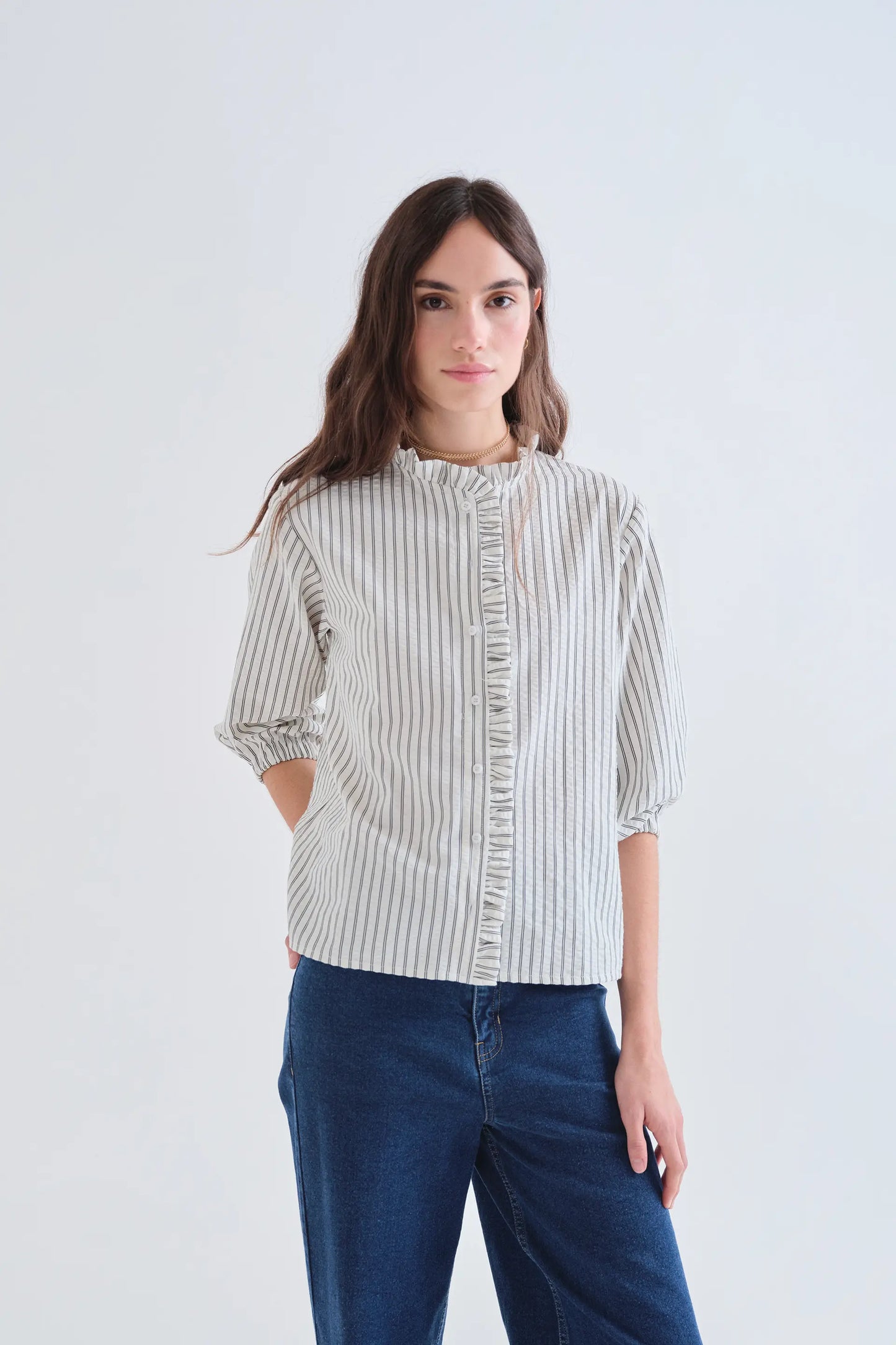 Black striped shirt with ruffle detail