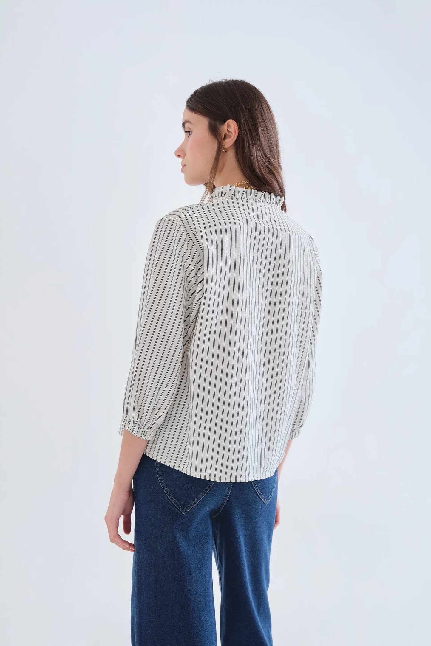 Black striped shirt with ruffle detail