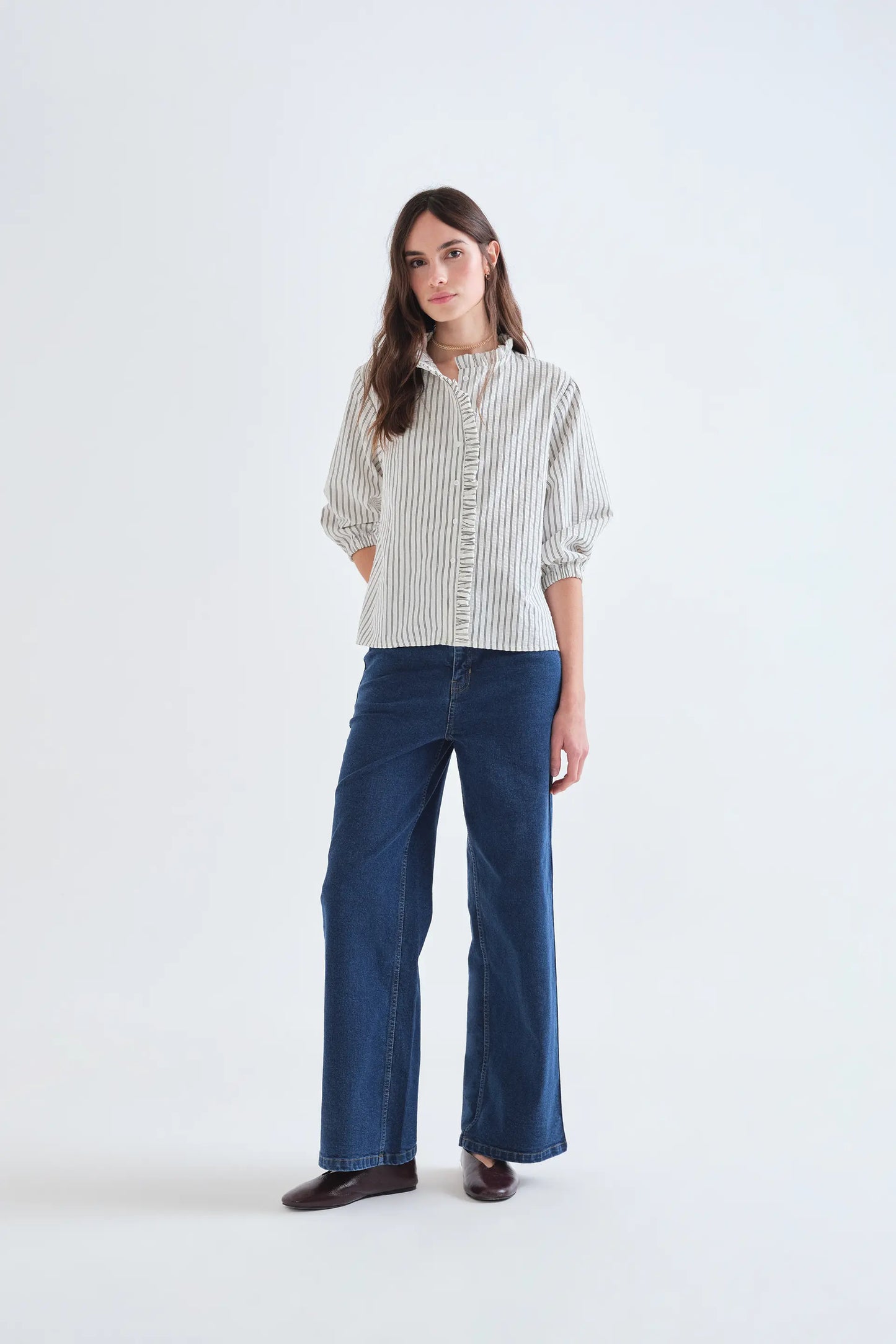 Black striped shirt with ruffle detail