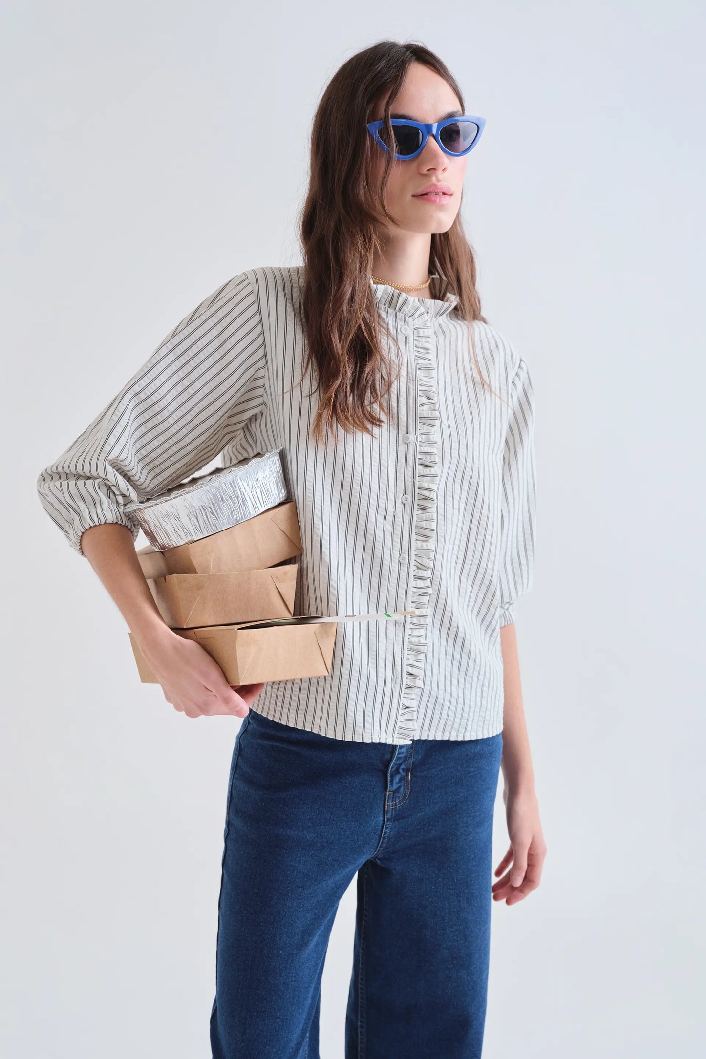Black striped shirt with ruffle detail