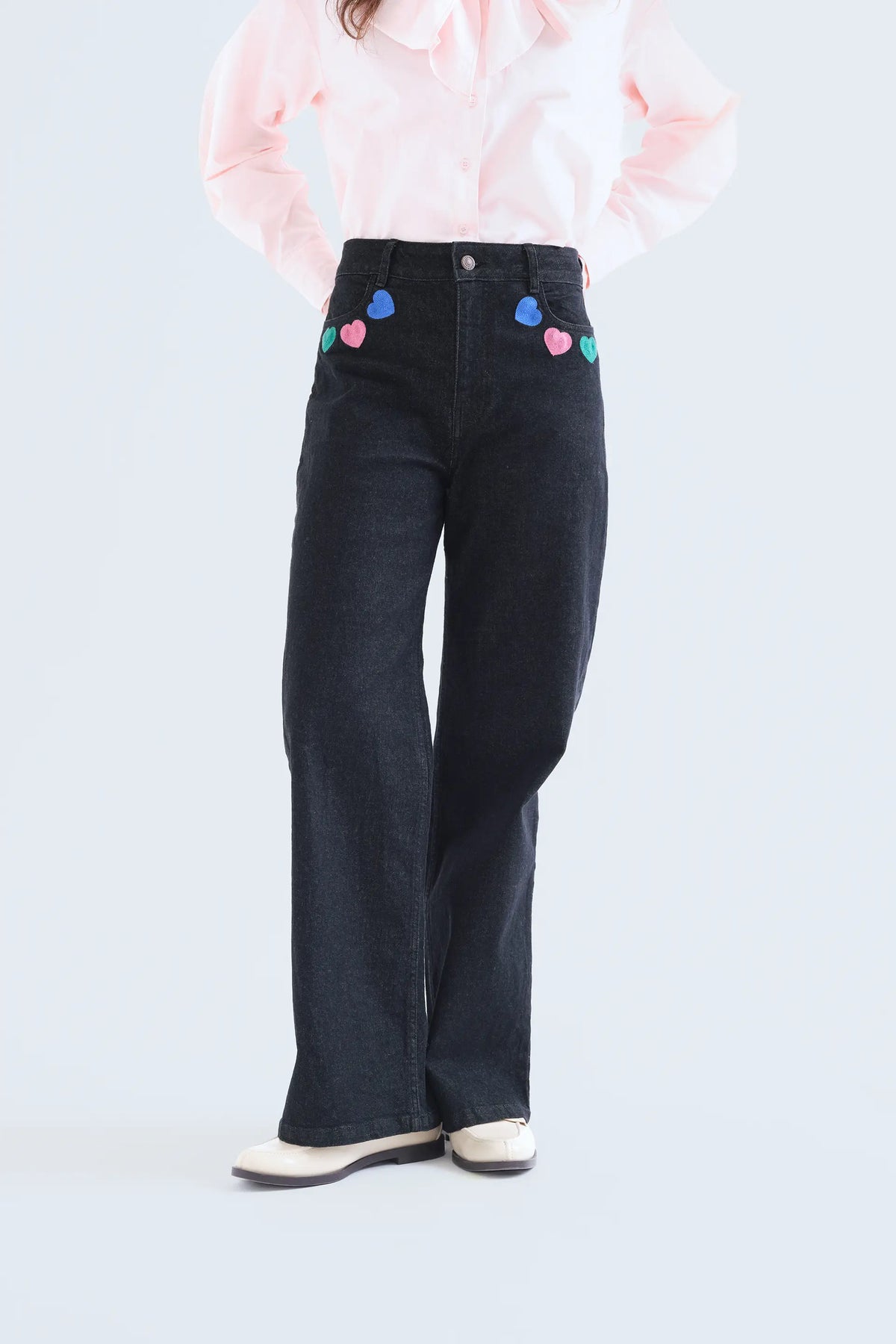 Jeans neri con stampa Candy