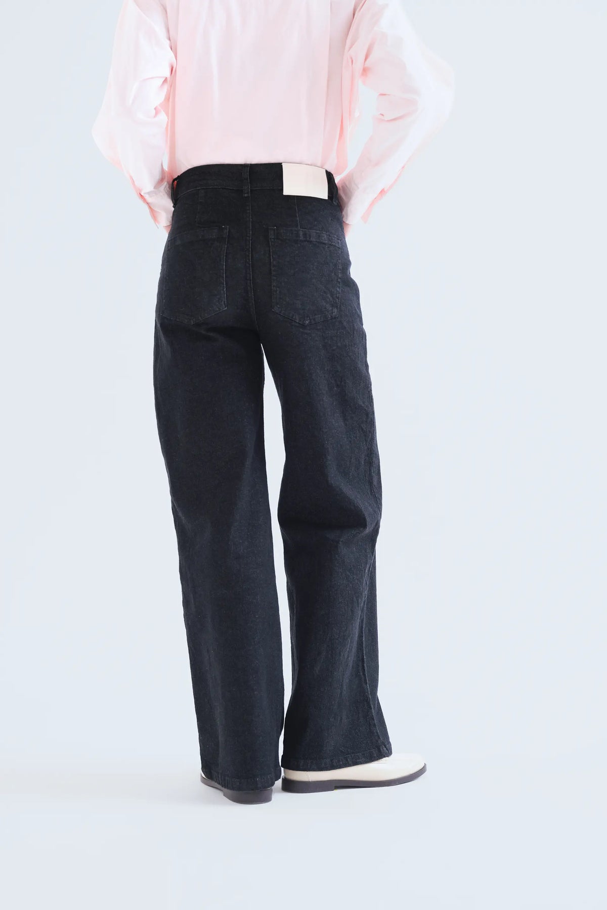 Jeans neri con stampa Candy