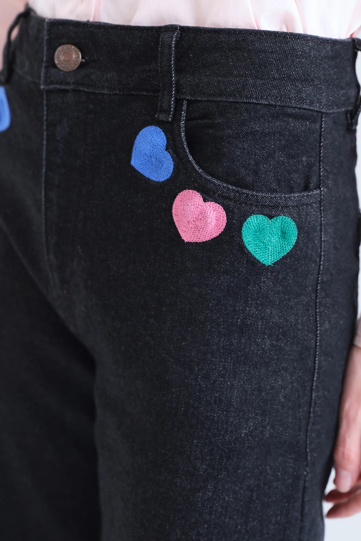 Jeans neri con stampa Candy