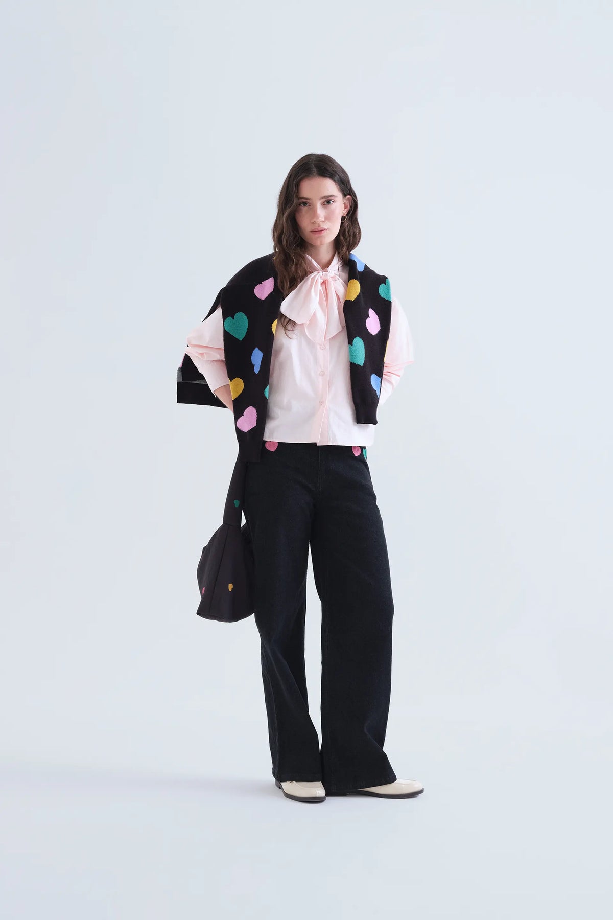 Jeans neri con stampa Candy