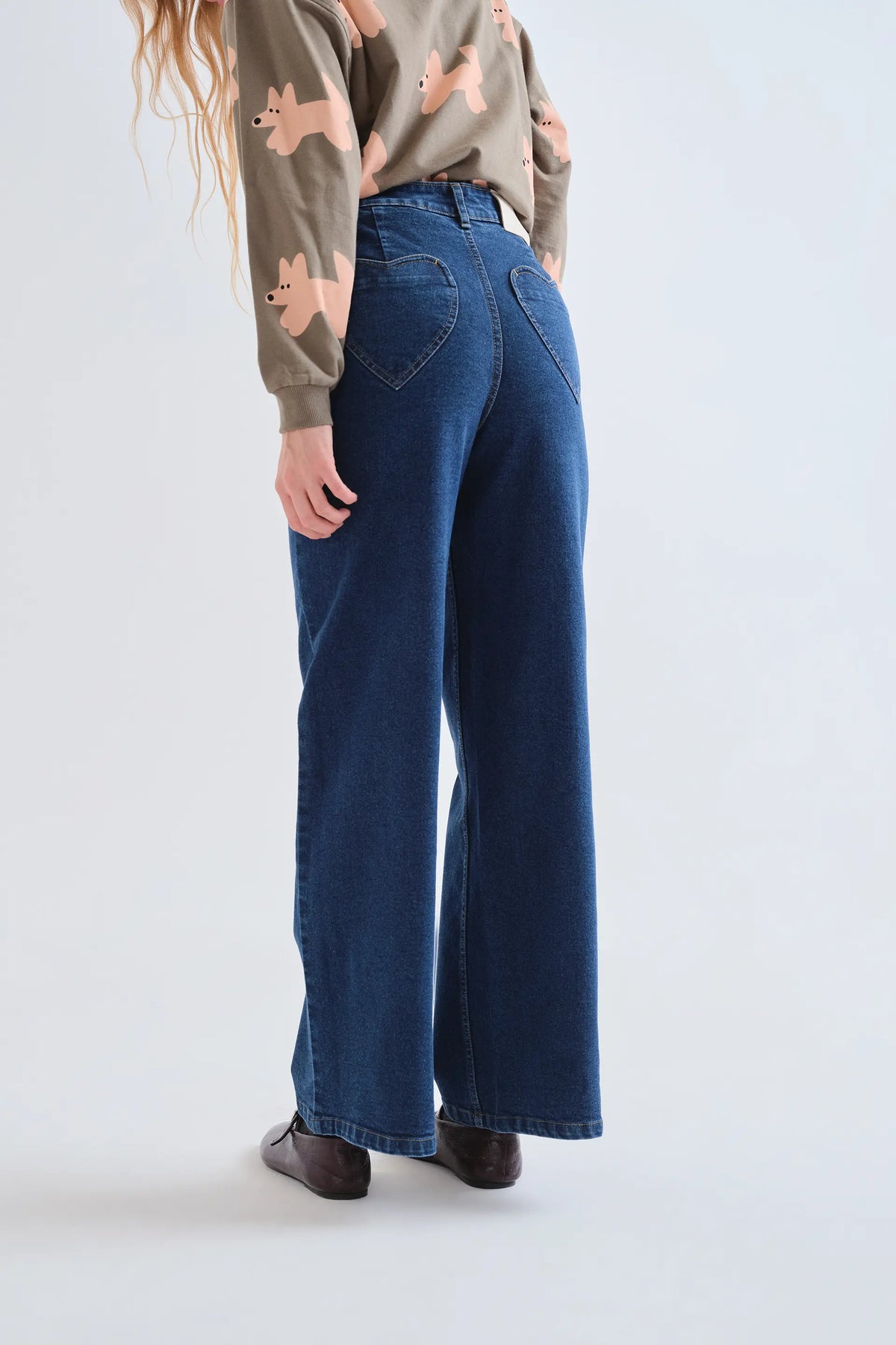 Navy blue jeans with heart pockets