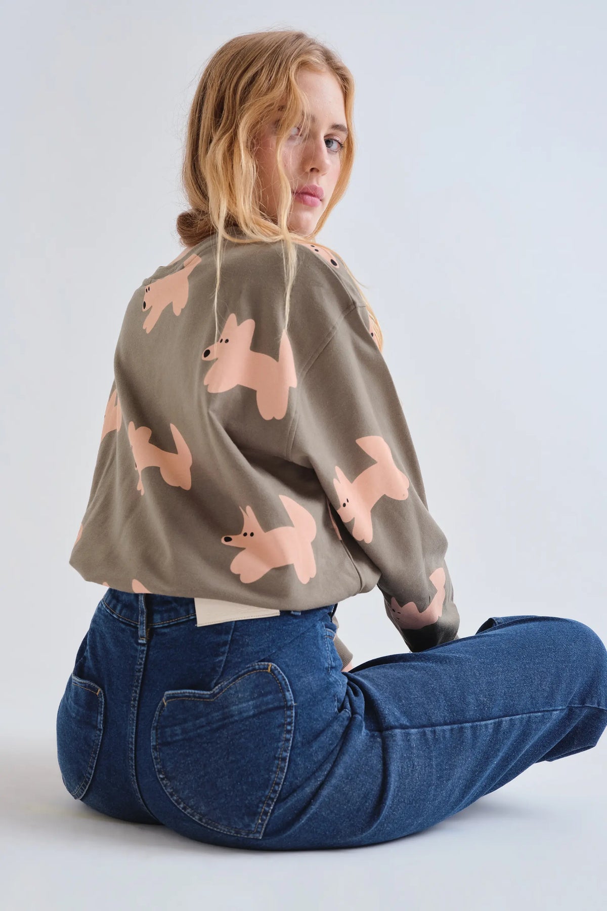 Navy blue jeans with heart pockets