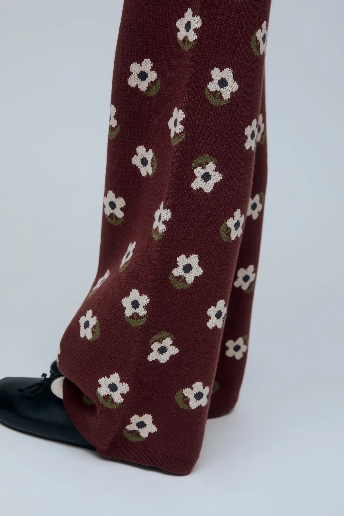 Girls' knit trousers with Santini print