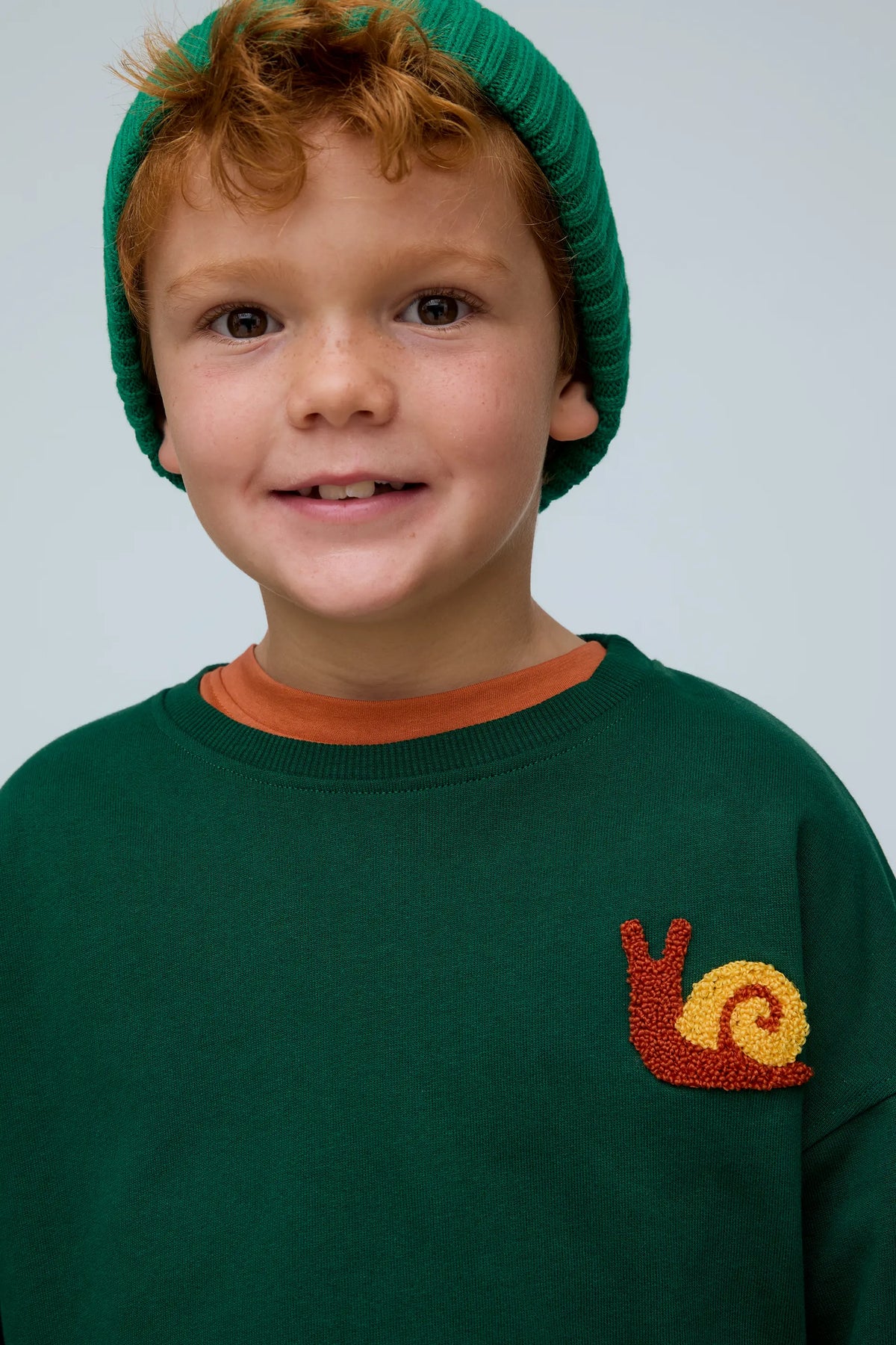 Sudadera unisex 100% algodón con bordado de Caracol