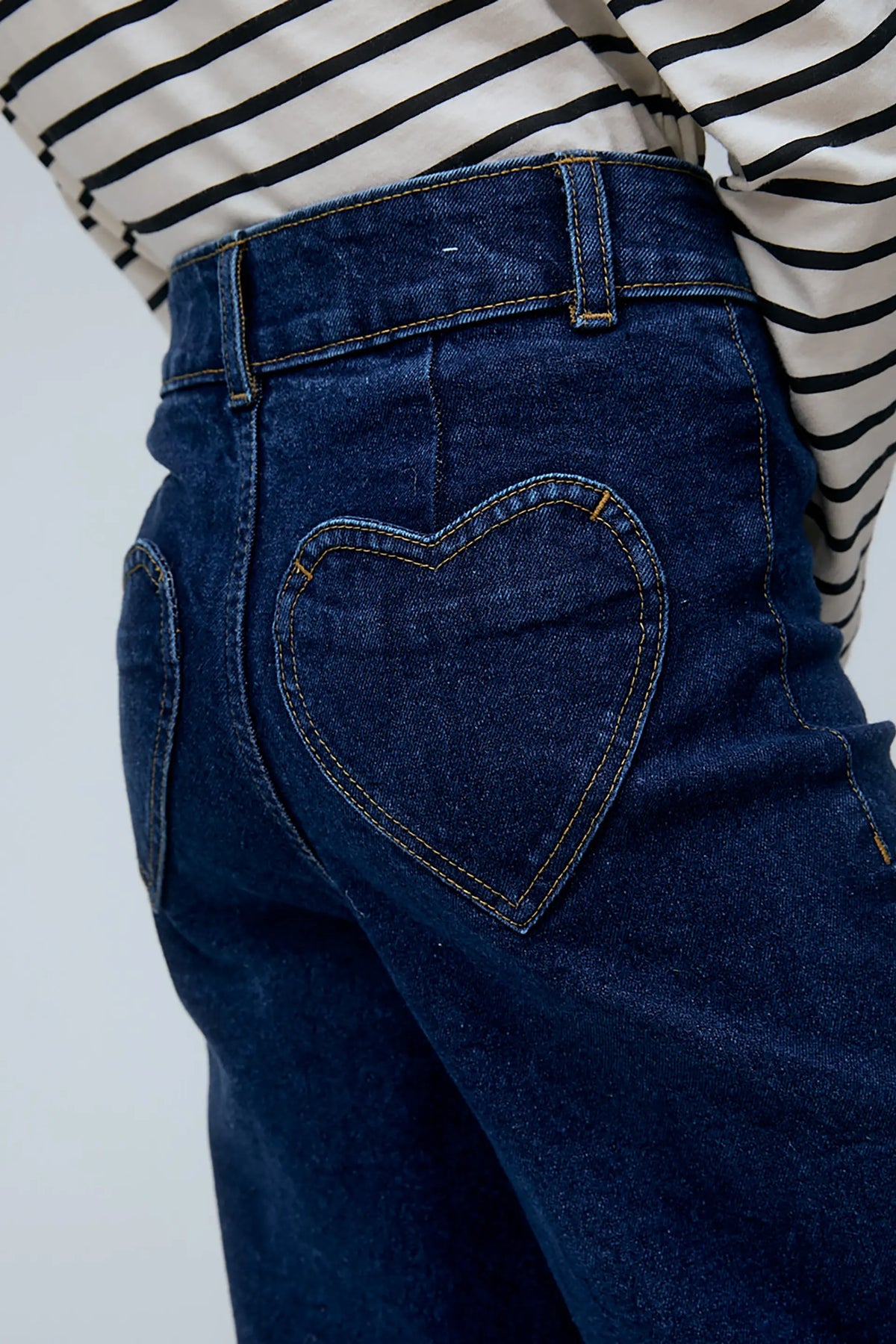Girl's navy blue jeans with heart pockets