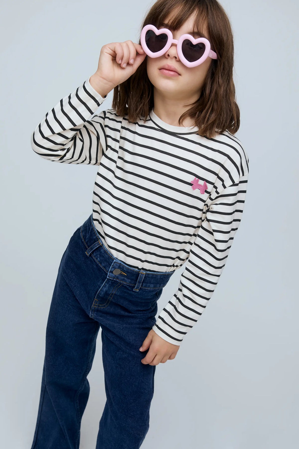 Girl's navy blue jeans with heart pockets